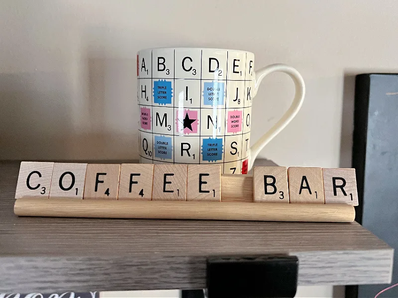 scrabble mug and tiles spelling coffee bar