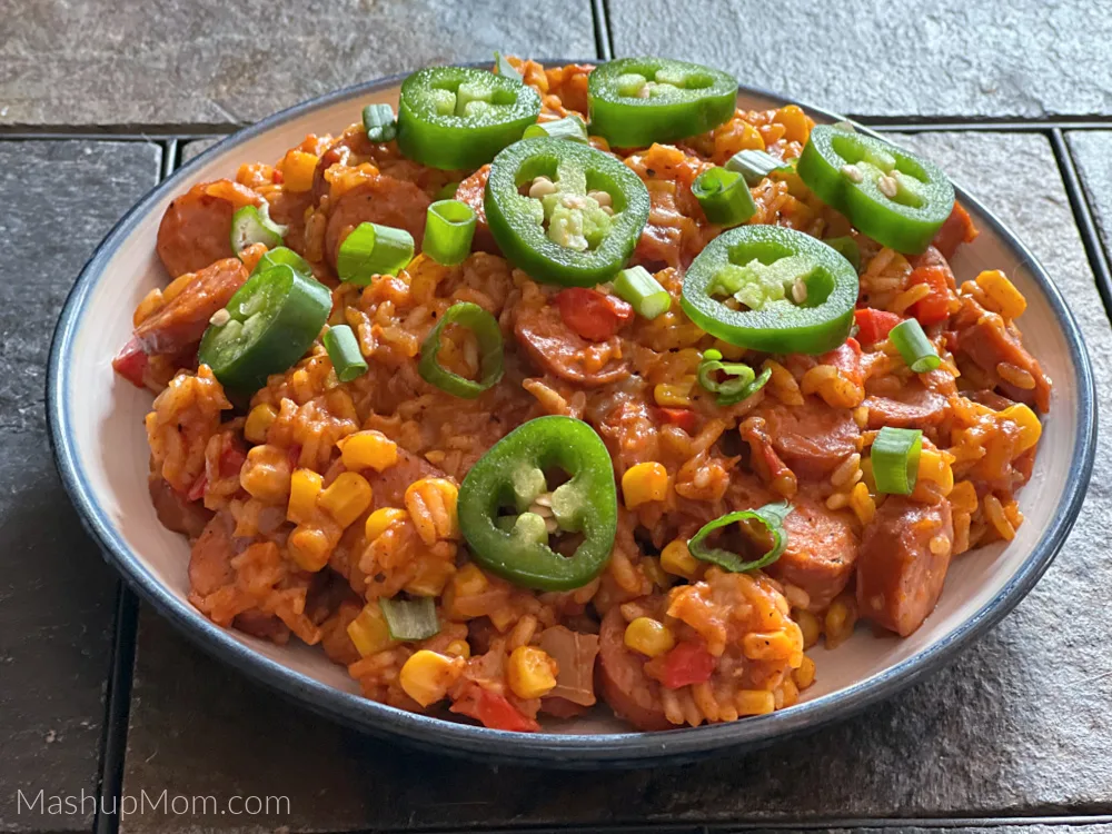 cheesy smoked sausage & rice skillet, topped with fresh jalapeños