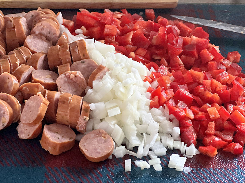 chop the onion bell pepper and sausage