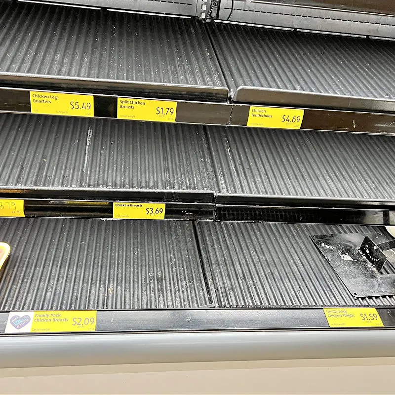 empty chicken shelves at aldi