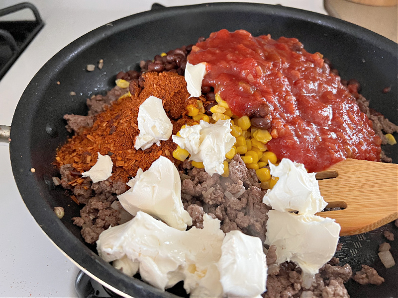 pan of ground beef with salsa corn and cream cheese