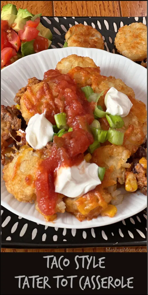 taco style tater tot casserole with assorted toppings