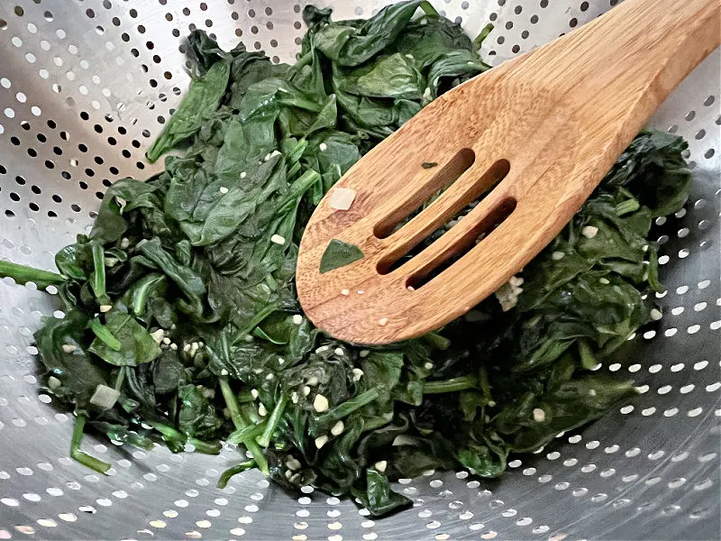 press water out of the spinach