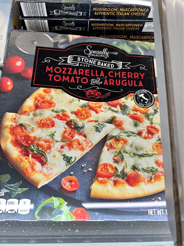 mozzarella cherry tomato arugula pizza