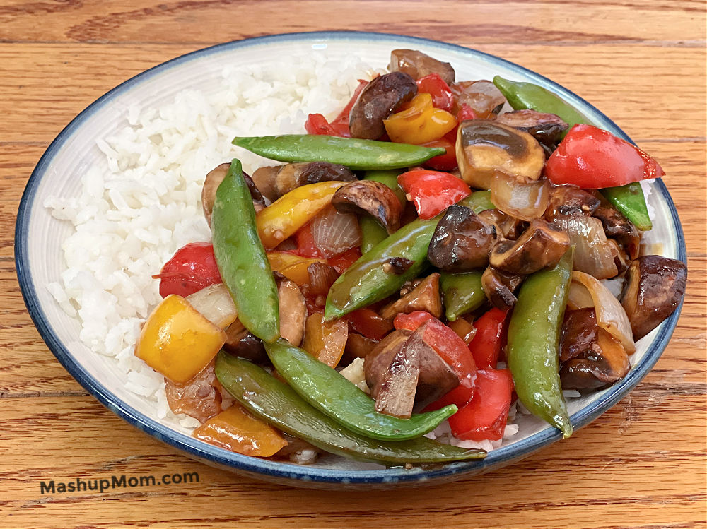 vegetarian stir fry on a plate with rice