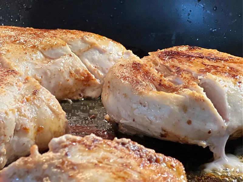 cooked chicken in the pan