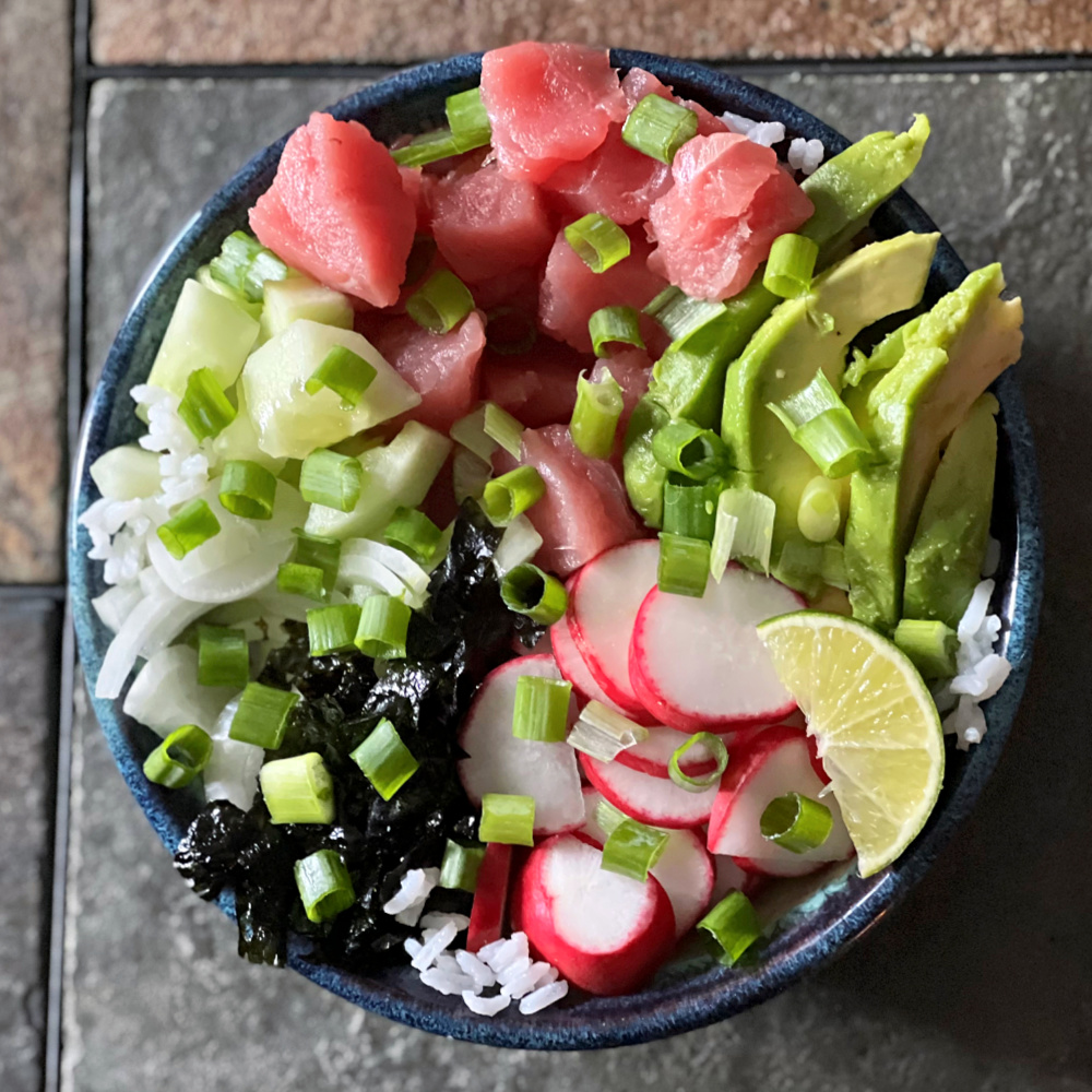 ahi tuna poke bowl with veggies and rice