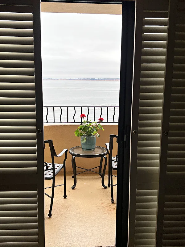 looking out the balcony to the water on the bay