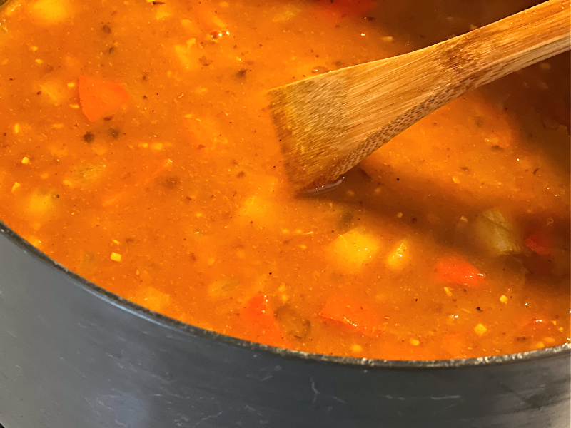 pot of soup simmering on the stove