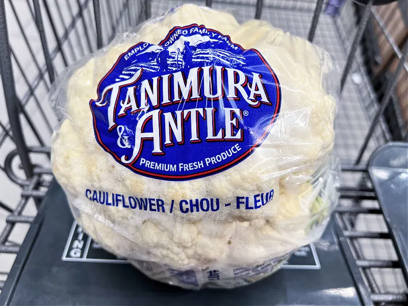 head of cauliflower in an aldi cart