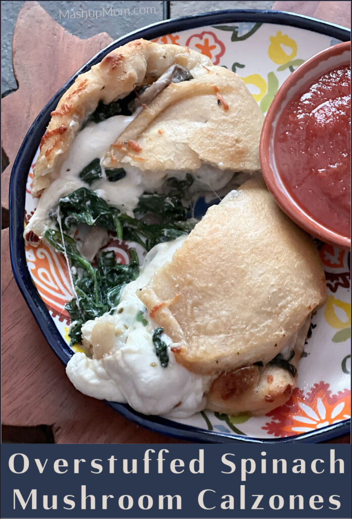 overstuffed spinach mushroom calzone with marinara sauce