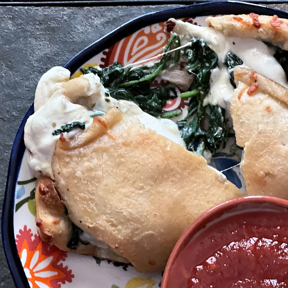 plate of spinach calzone