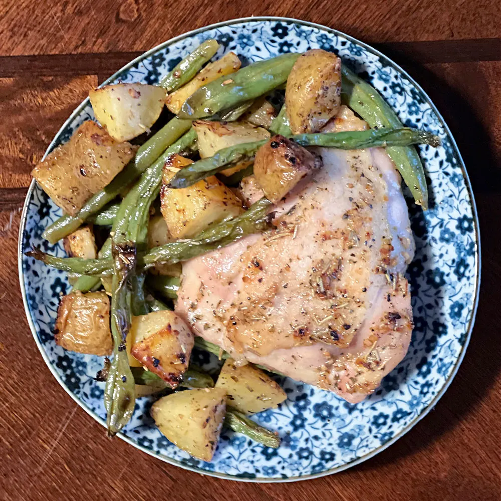 plate of chicken and potatoes and green beans
