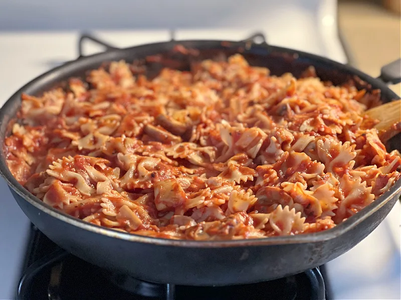 skillet full of pasta and sauce