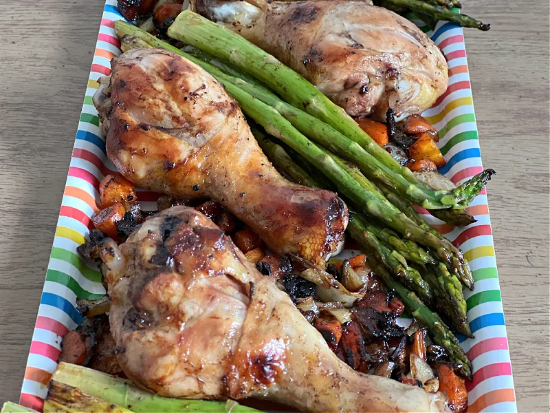 chicken drumsticks and veggies in colorful combination