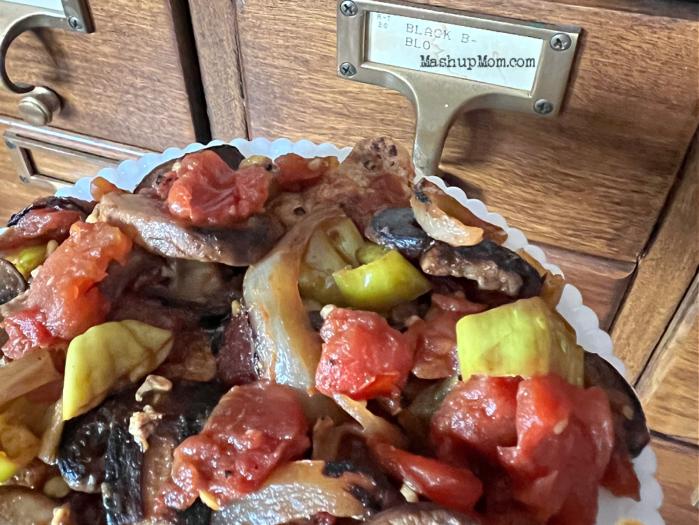 pork chop smothered in pepperoncini mushrooms onions and tomatoes
