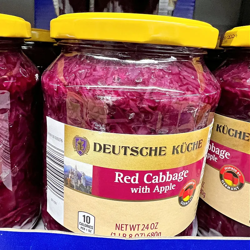 red cabbage with apples in a jar