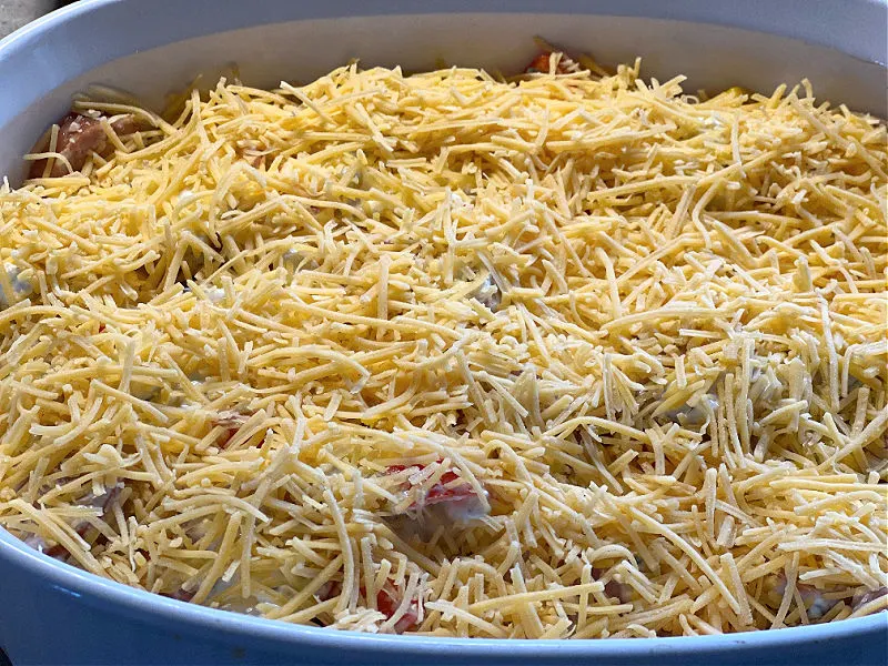 top with shredded cheddar