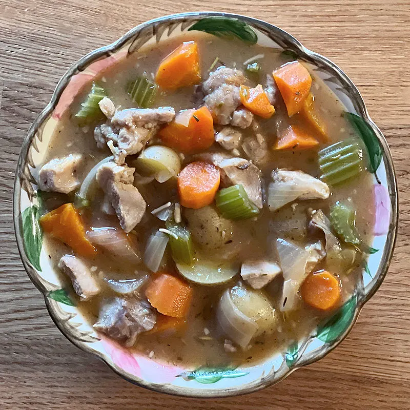 chicken stew in a flowered bowl