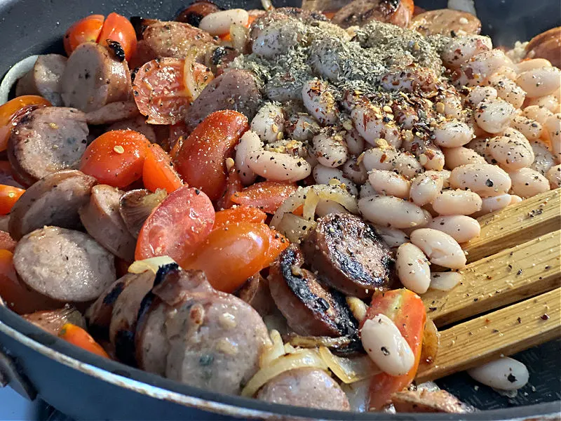 add the beans and seasonings to the pan
