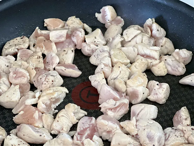 brown the chicken pieces in a skillet