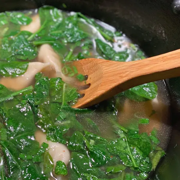 wilt spinach into the soup