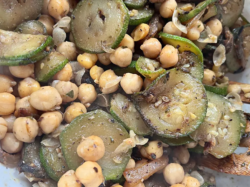 sauteed chickpeas and zucchini in a bowl